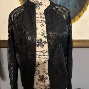 Lanston sport set. Shorts and jacket. Size small NWT. Quick wick technology